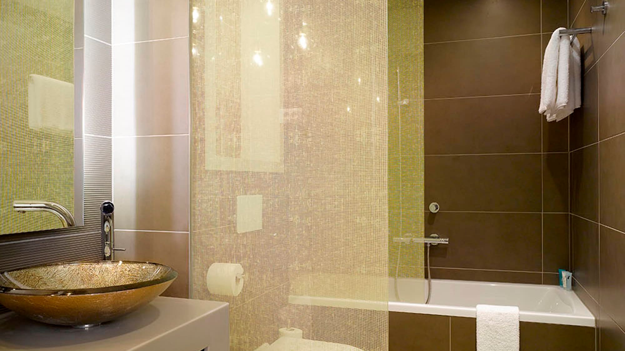 a bathroom with a sink and shower curtain