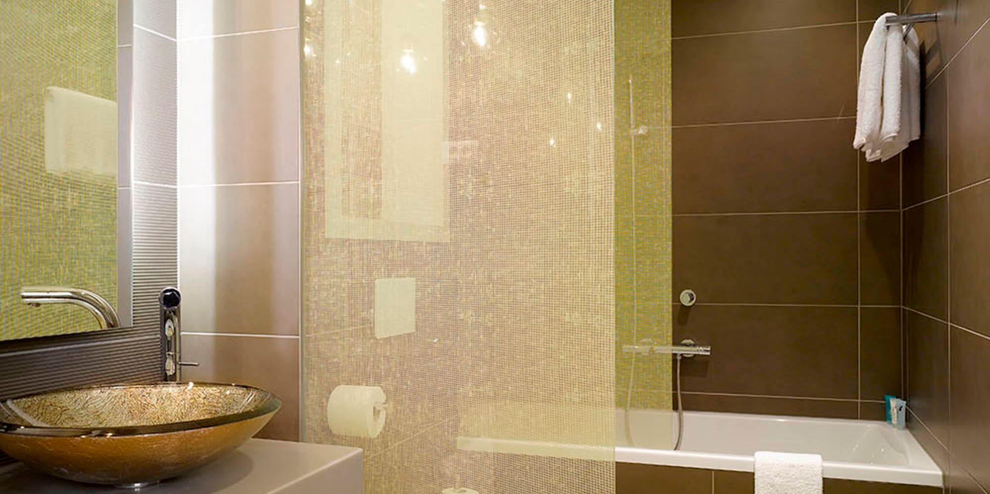 a bathroom with a sink and shower curtain
