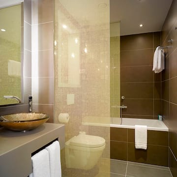 a bathroom with a sink and shower curtain
