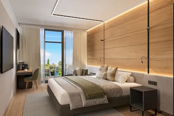 a bedroom with a bed and desk