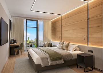 a bedroom with a bed and desk