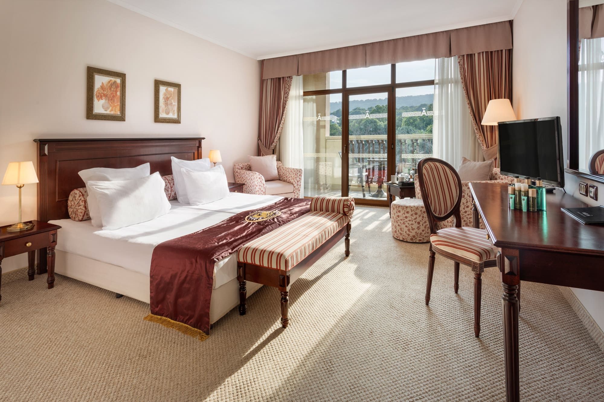 a bedroom with a bed and a table