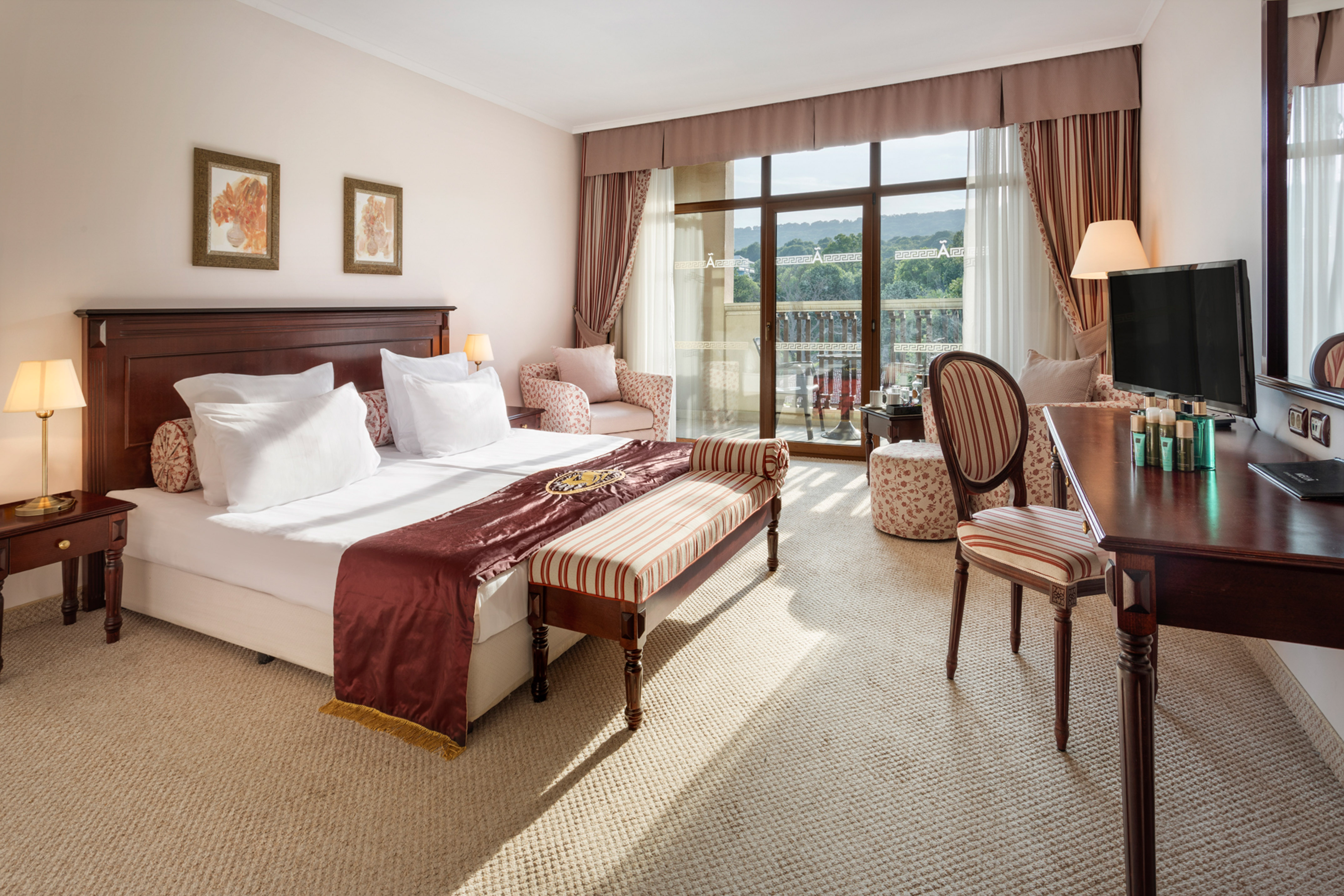 a bedroom with a bed and a table