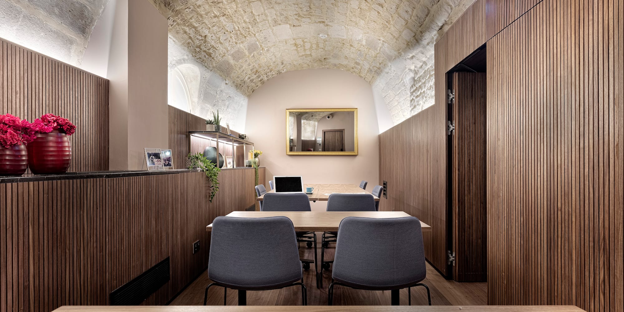 a room with a table and chairs