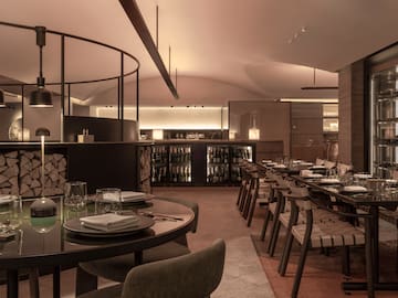 a room with tables and chairs