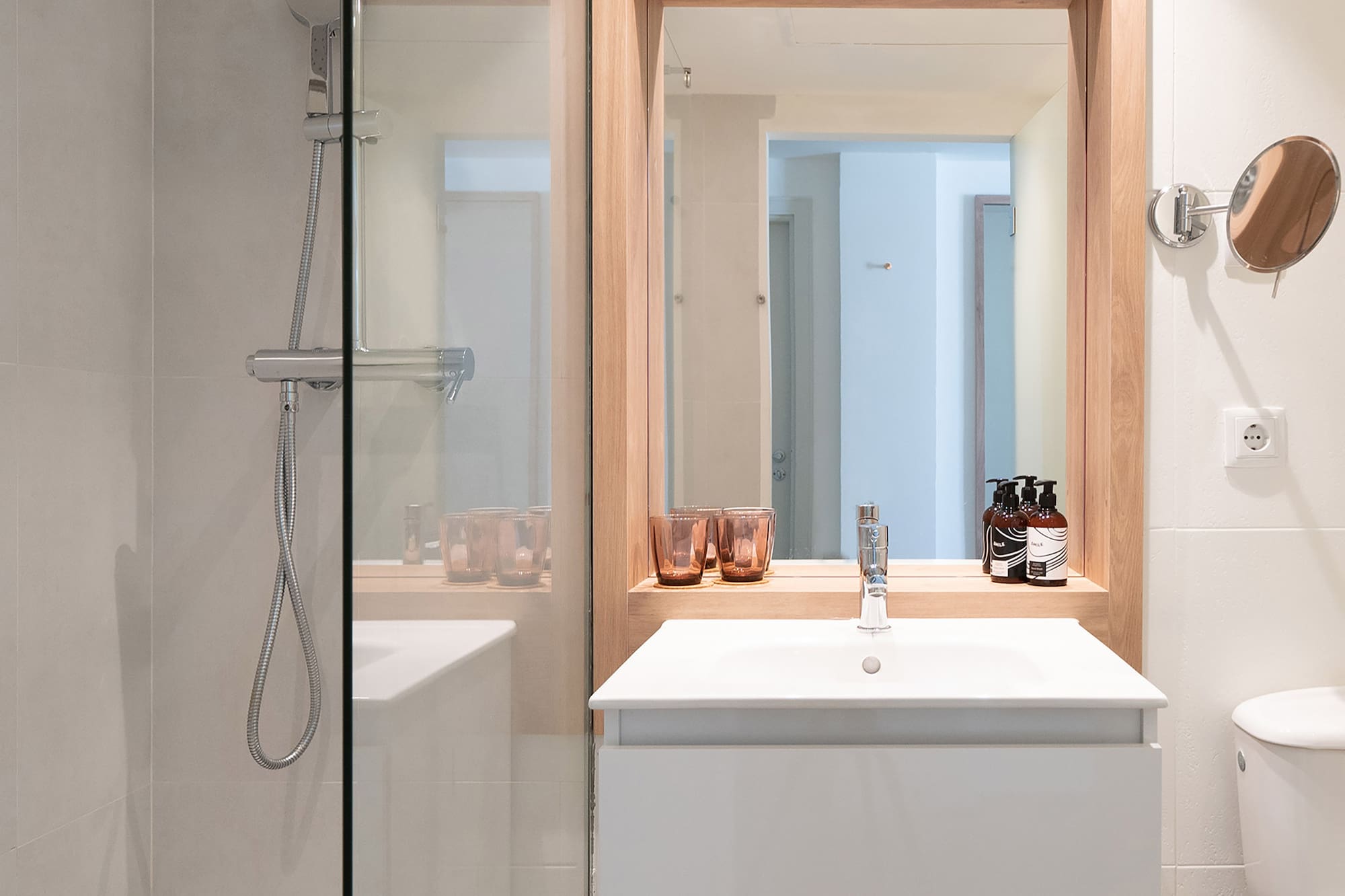 a bathroom with a mirror and sink