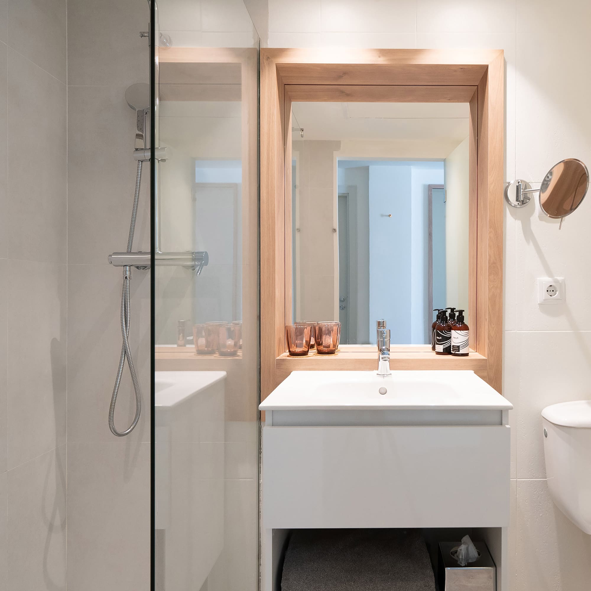 a bathroom with a mirror and sink