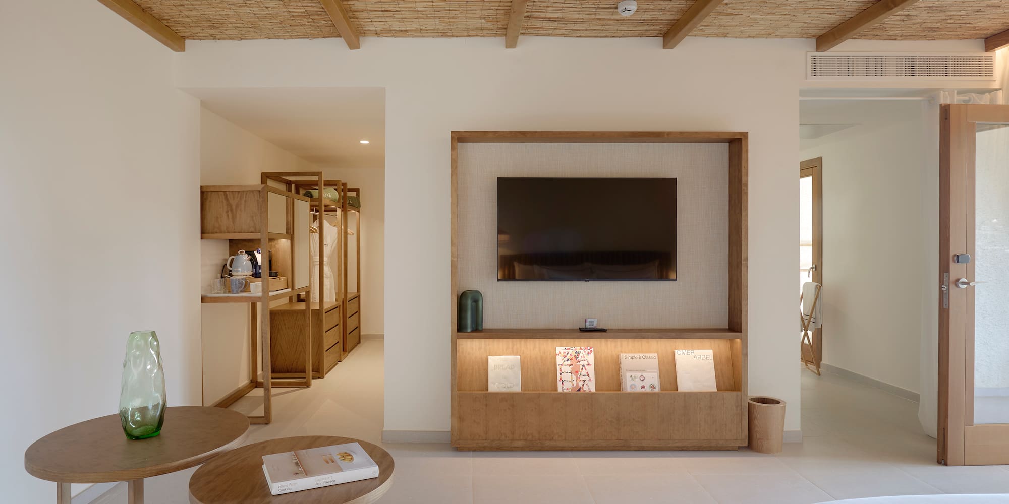 a room with a television and a table