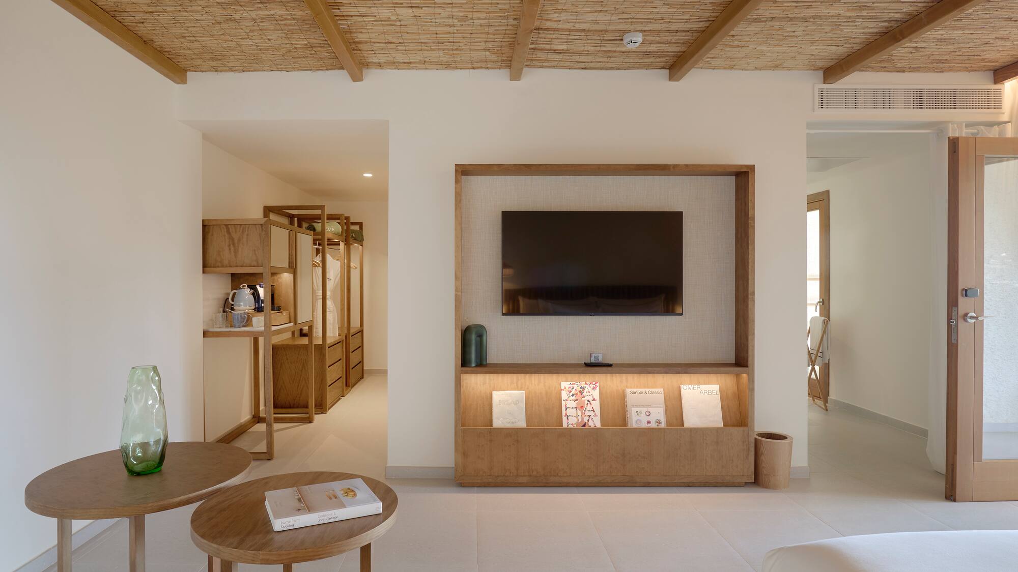 a room with a television and a table