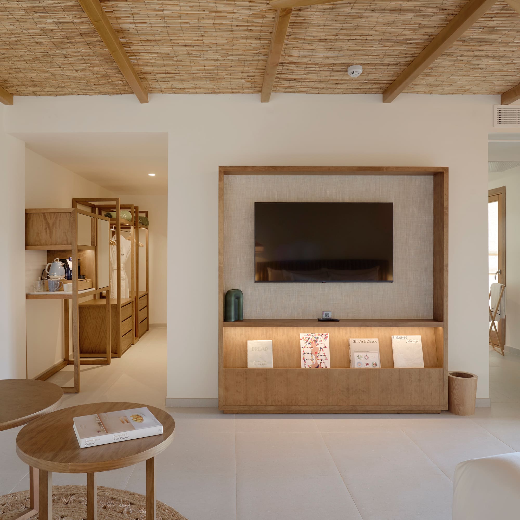 a room with a television and a table