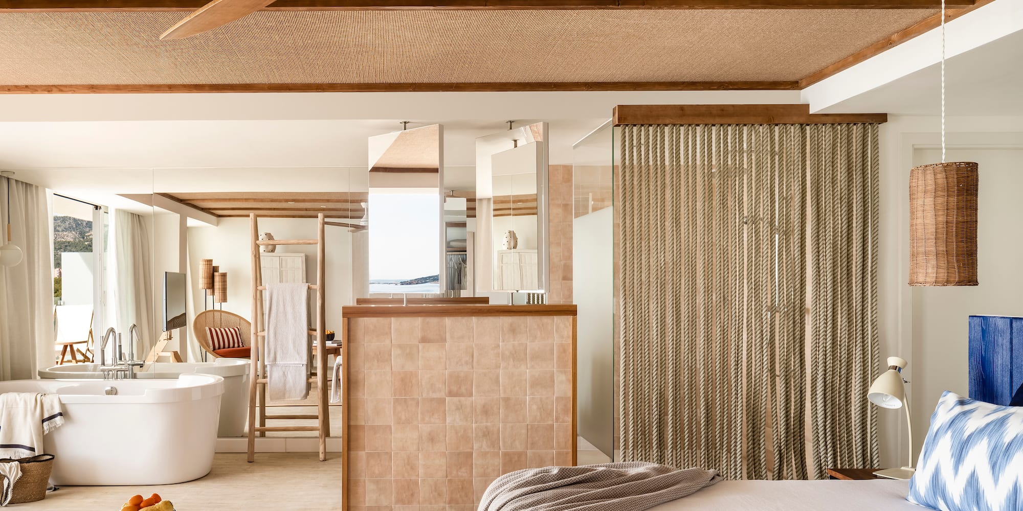 a room with a bed and a bathtub