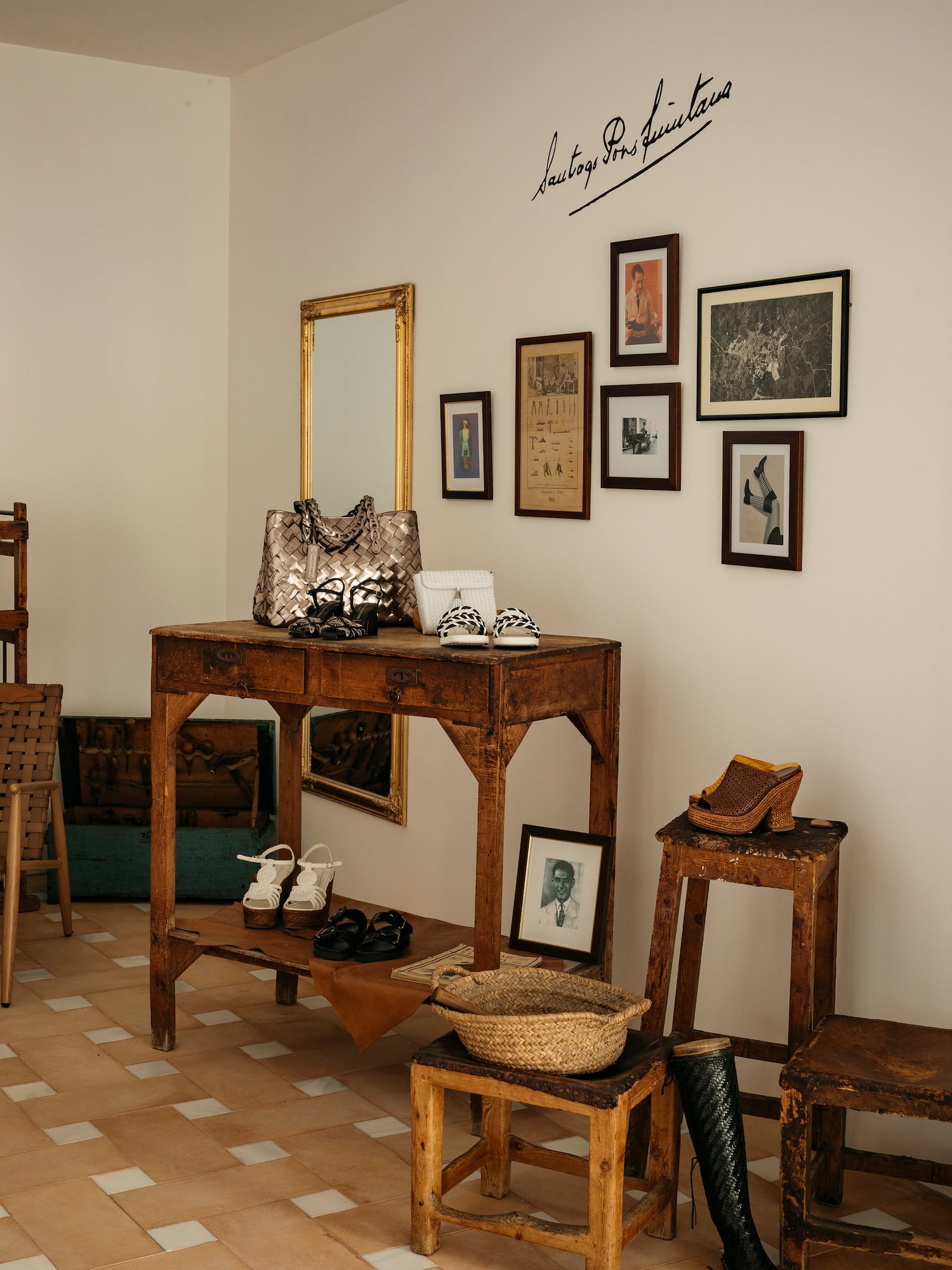 a room with a table and chairs and a mirror