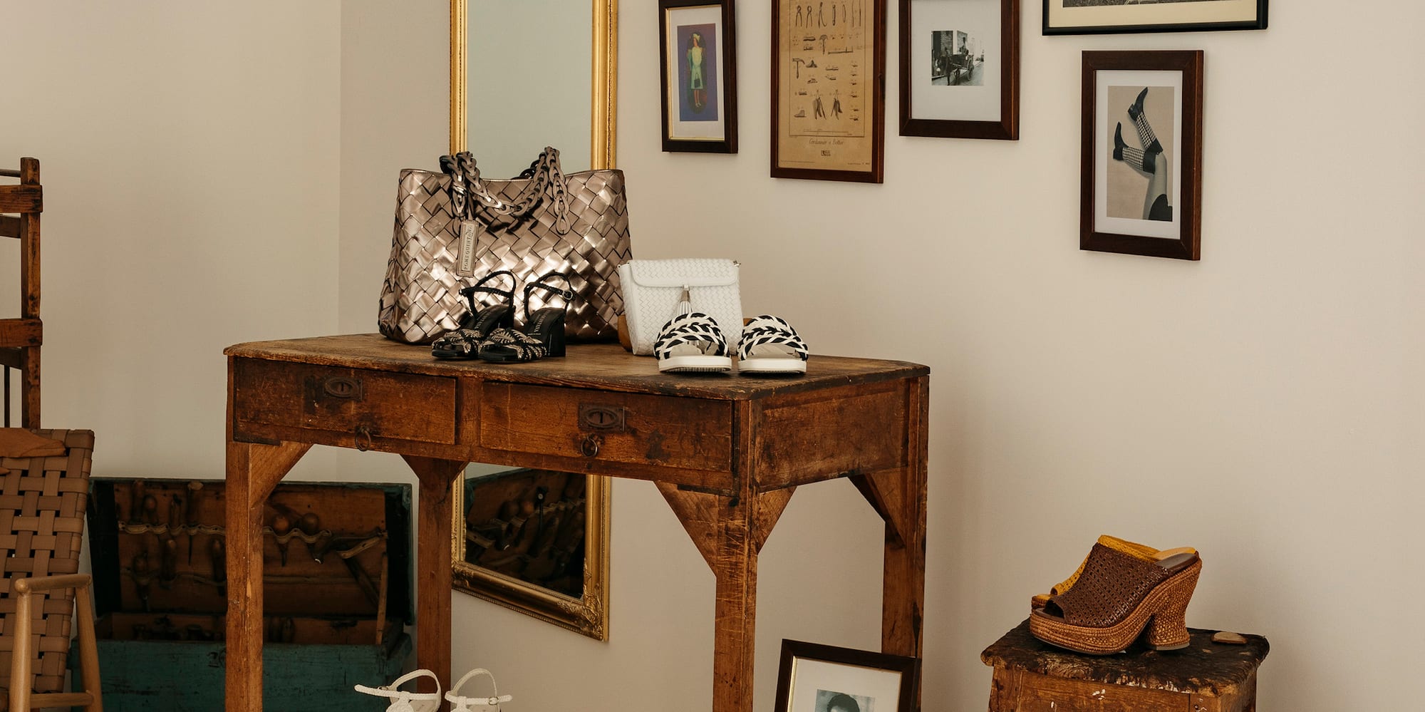 a room with a table and chairs and a mirror