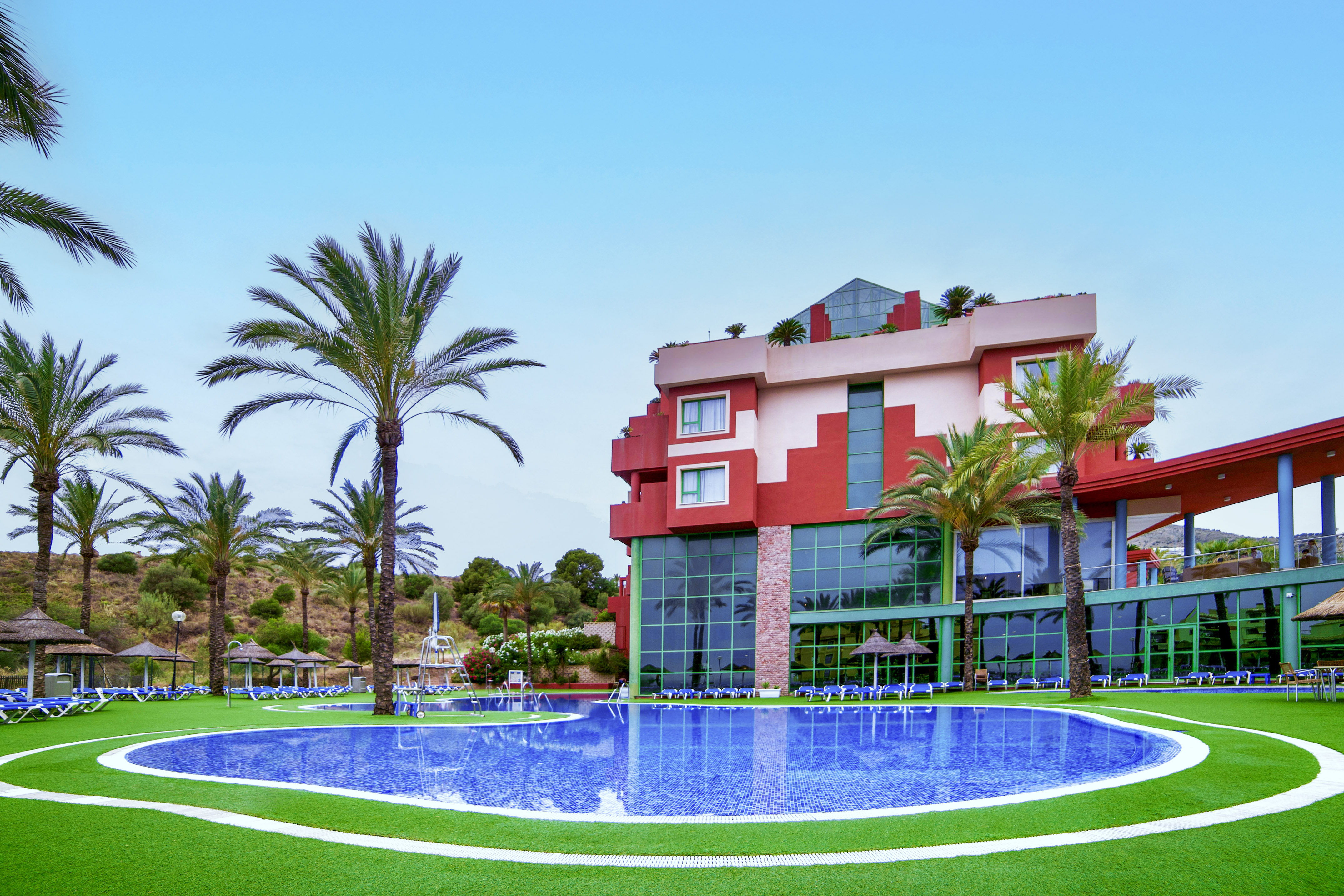 a pool in front of a building