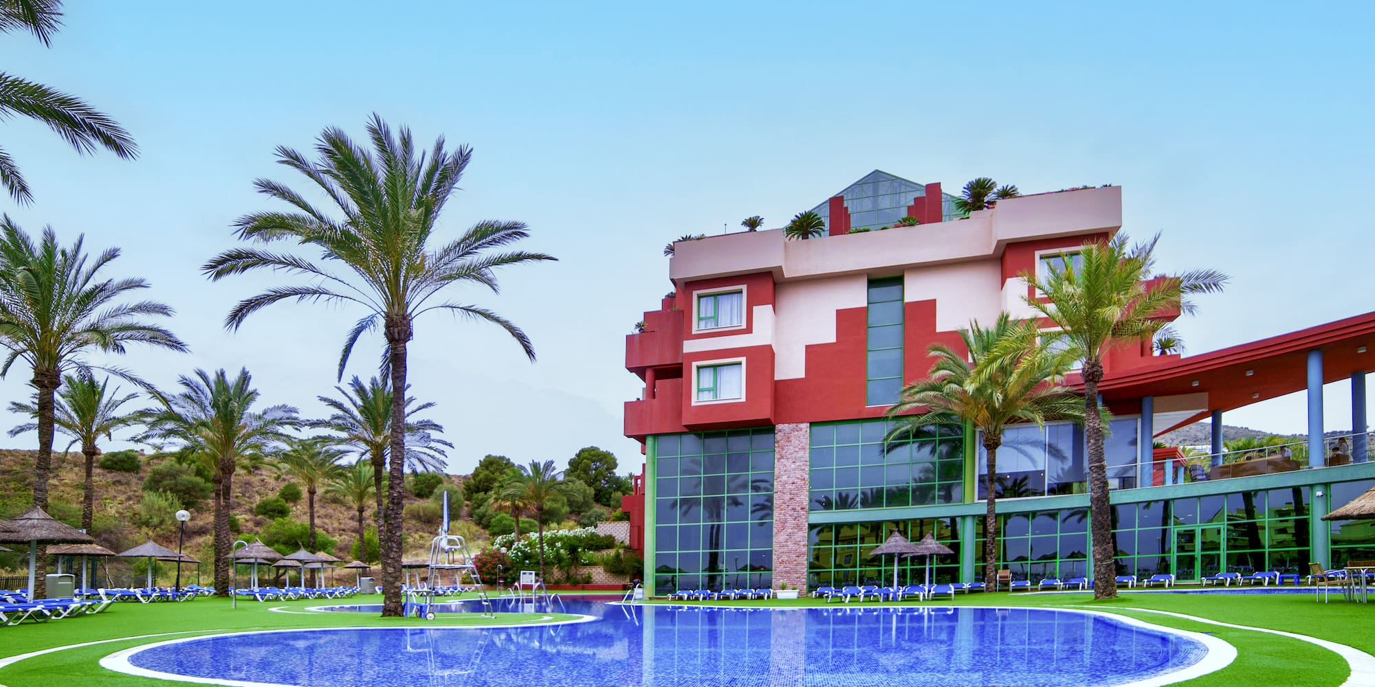 a pool in front of a building