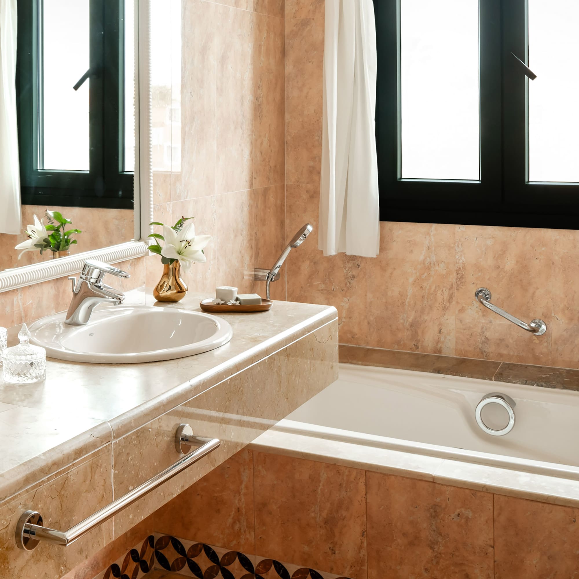 a bathroom with a sink and bathtub