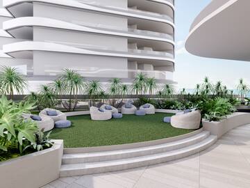 a patio with a round area with plants and a round staircase