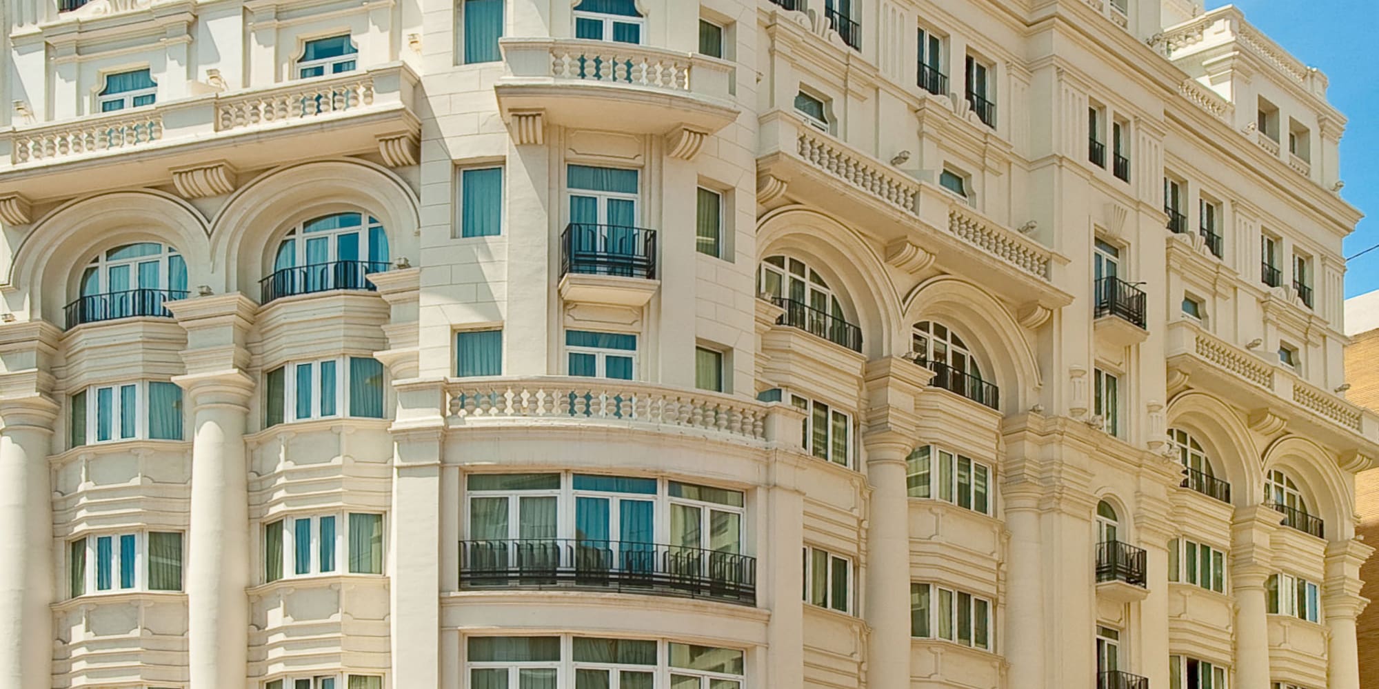 a large white building with many windows