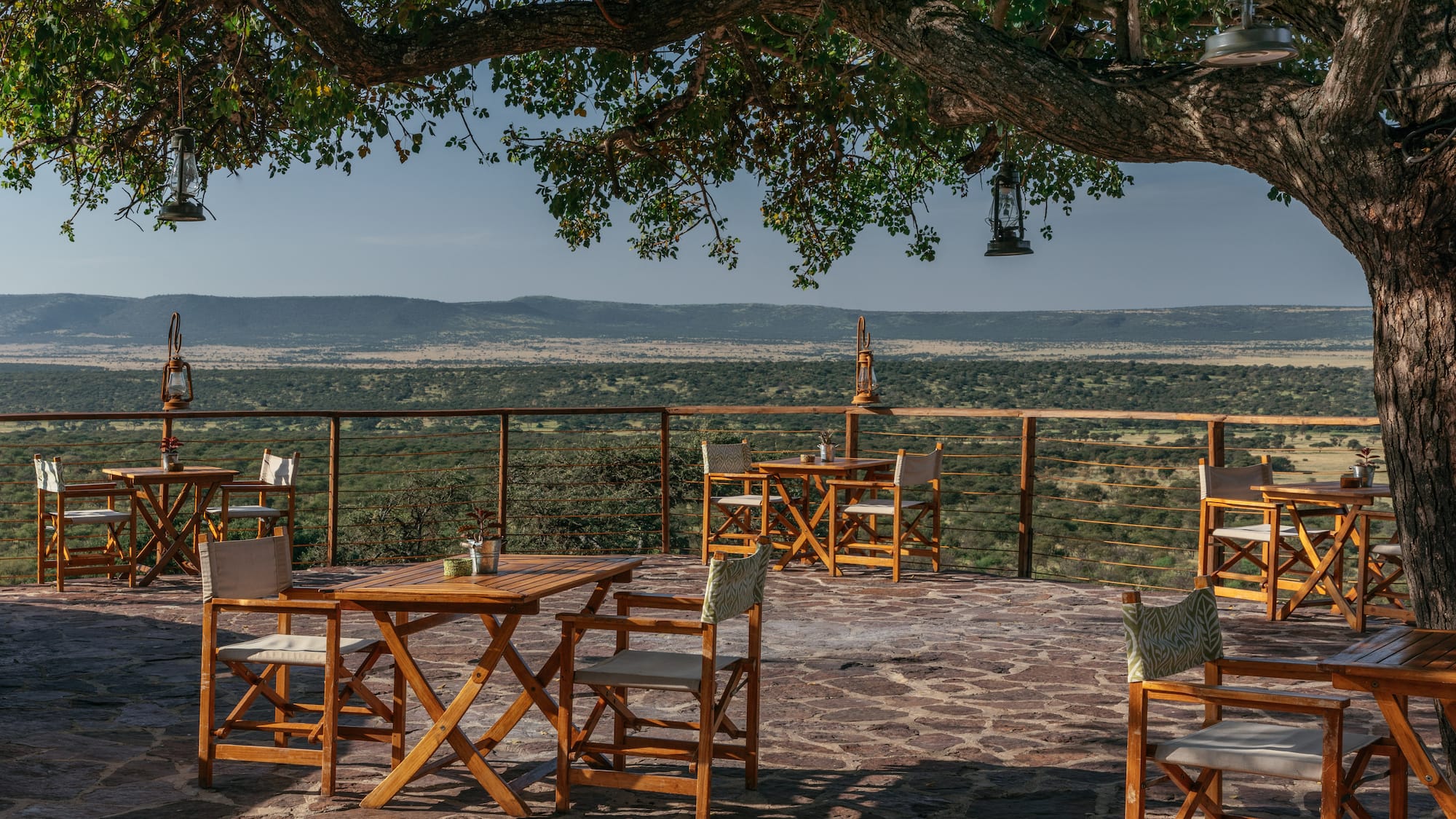 a table and chairs on a patio