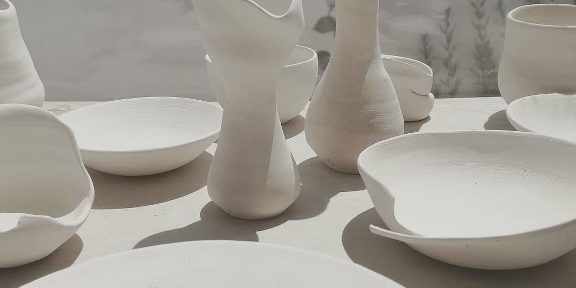 a group of white ceramic objects
