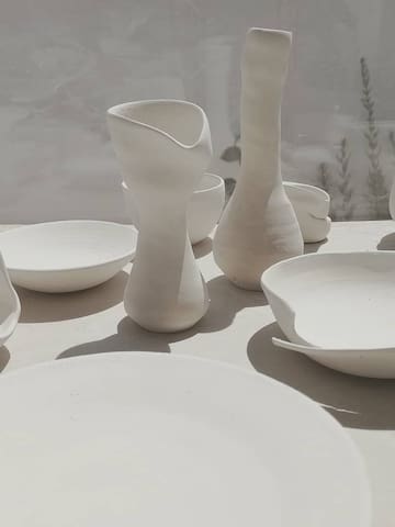 a group of white ceramic objects