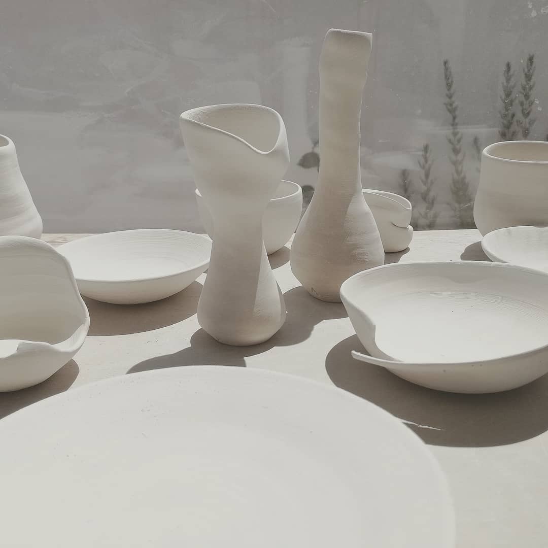 a group of white ceramic objects
