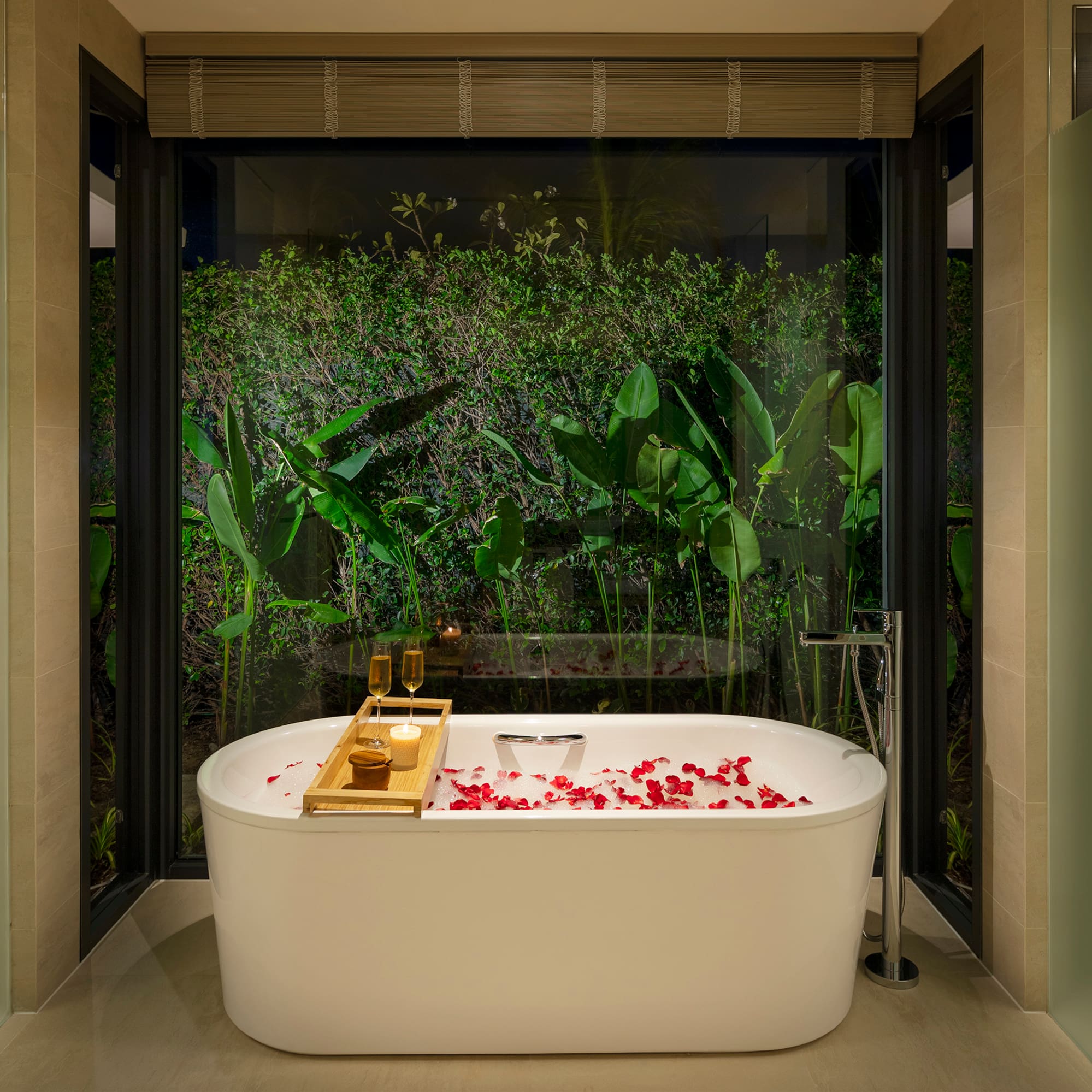 a bathtub with flowers in it