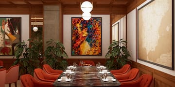 a room with a table and chairs