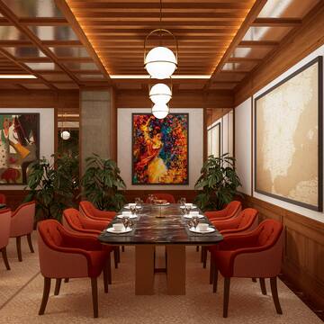 a room with a table and chairs