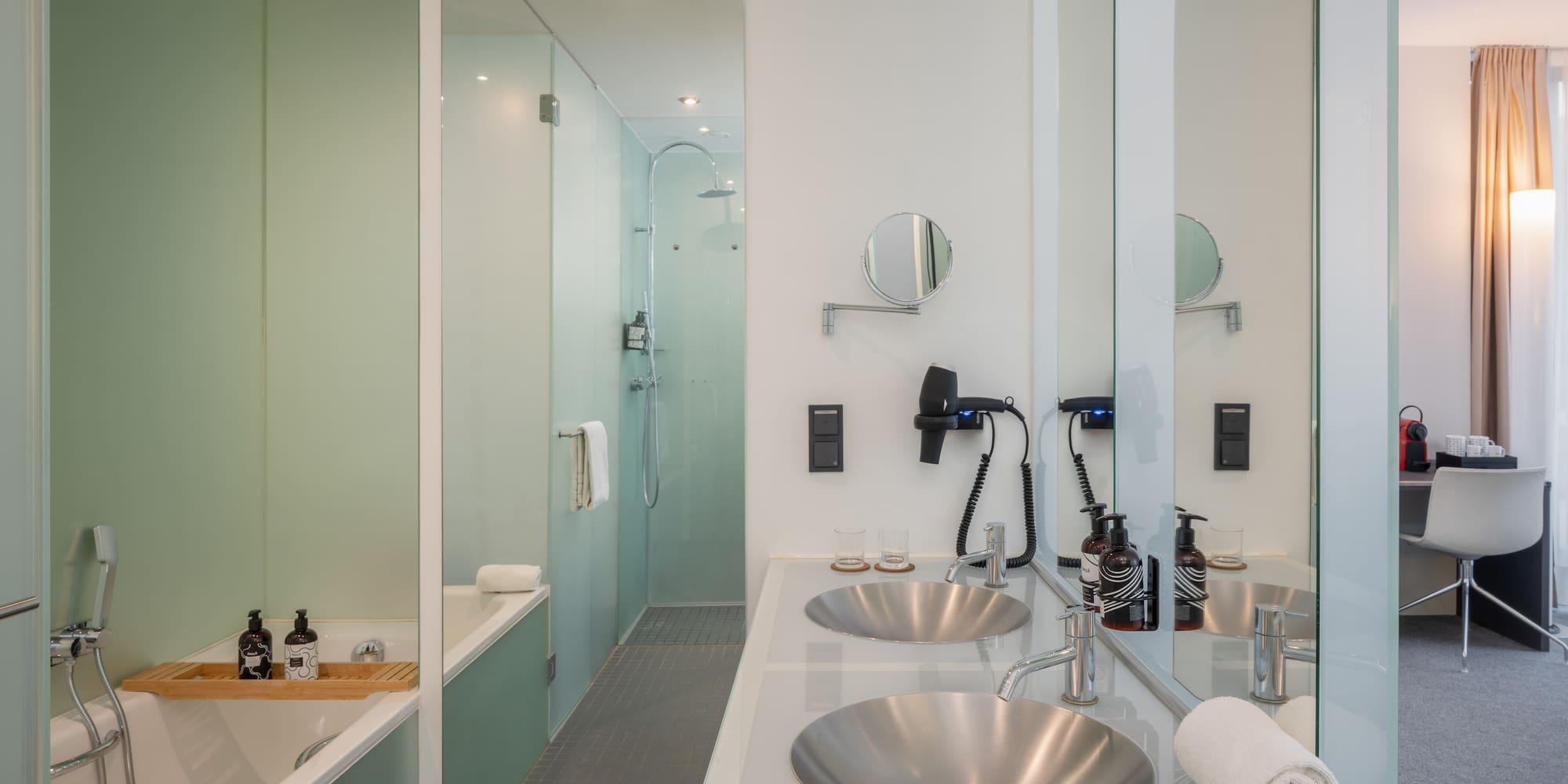 a bathroom with a shower and sink