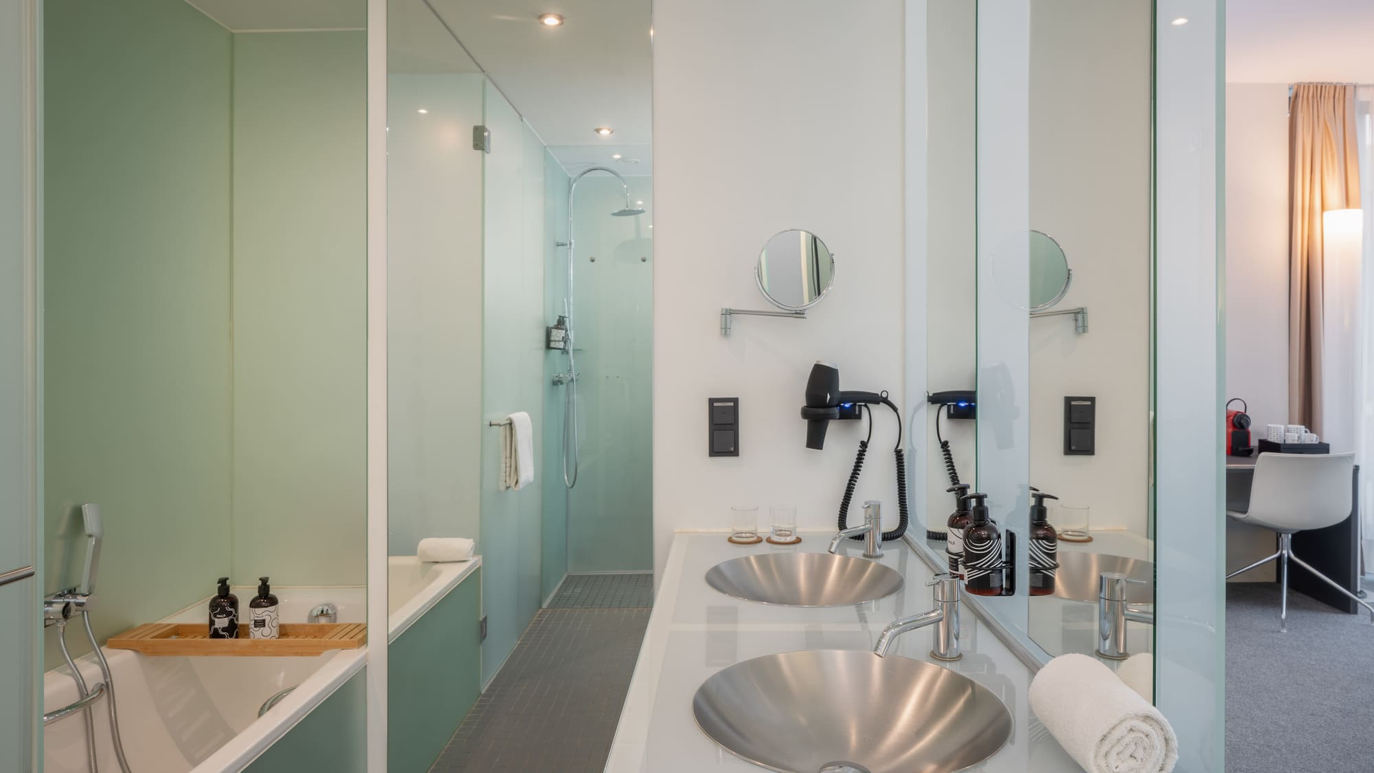 a bathroom with a shower and sink