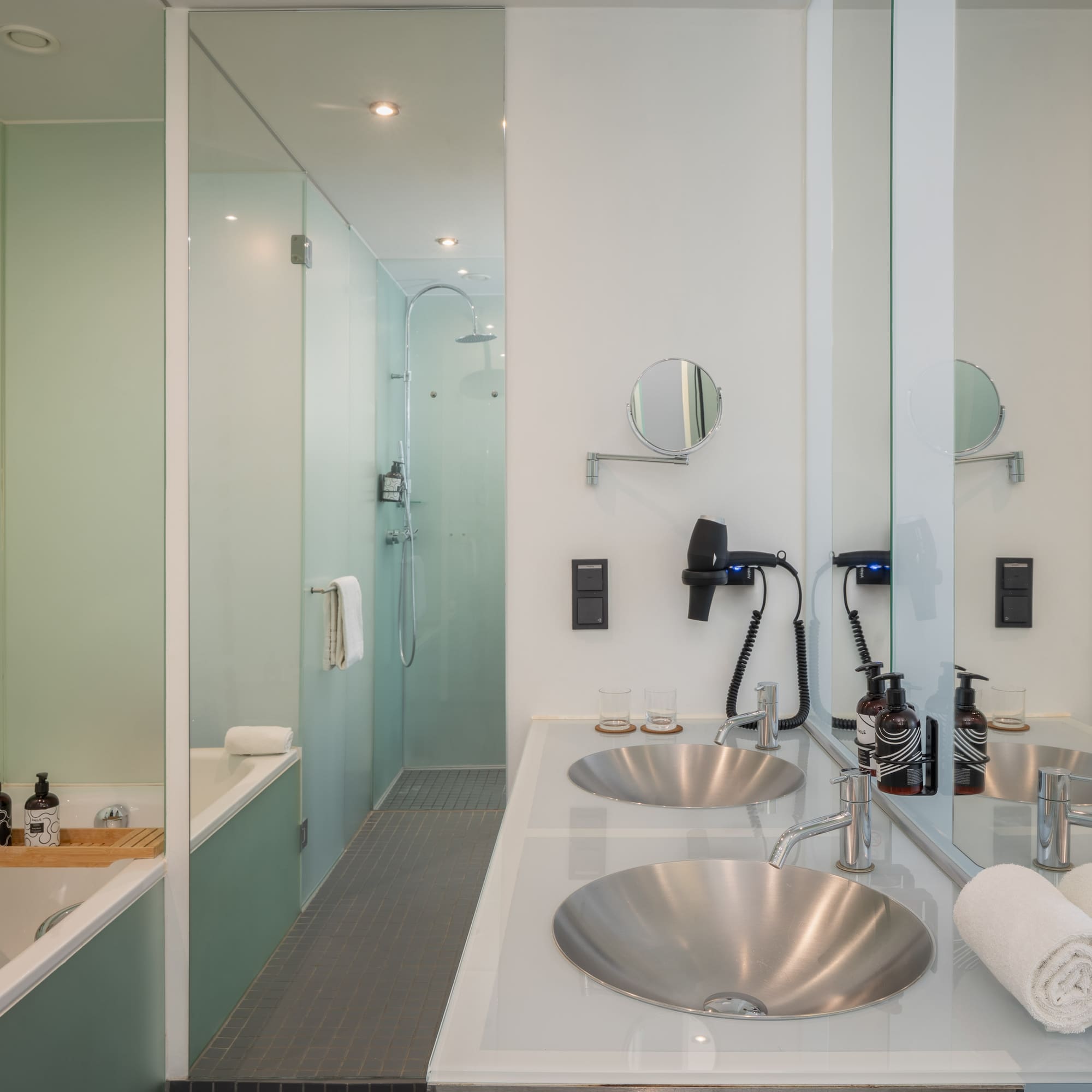 a bathroom with a shower and sink