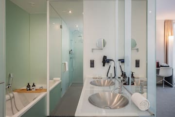 a bathroom with a shower and sink
