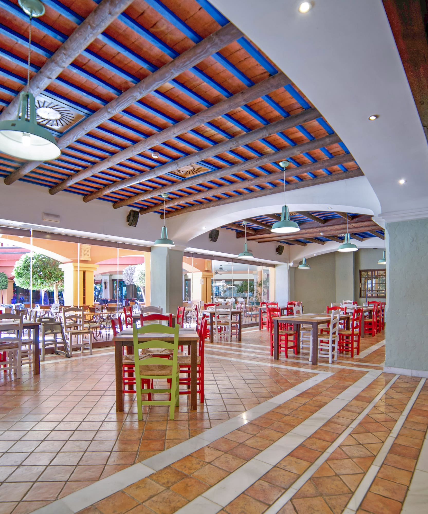 a large room with tables and chairs