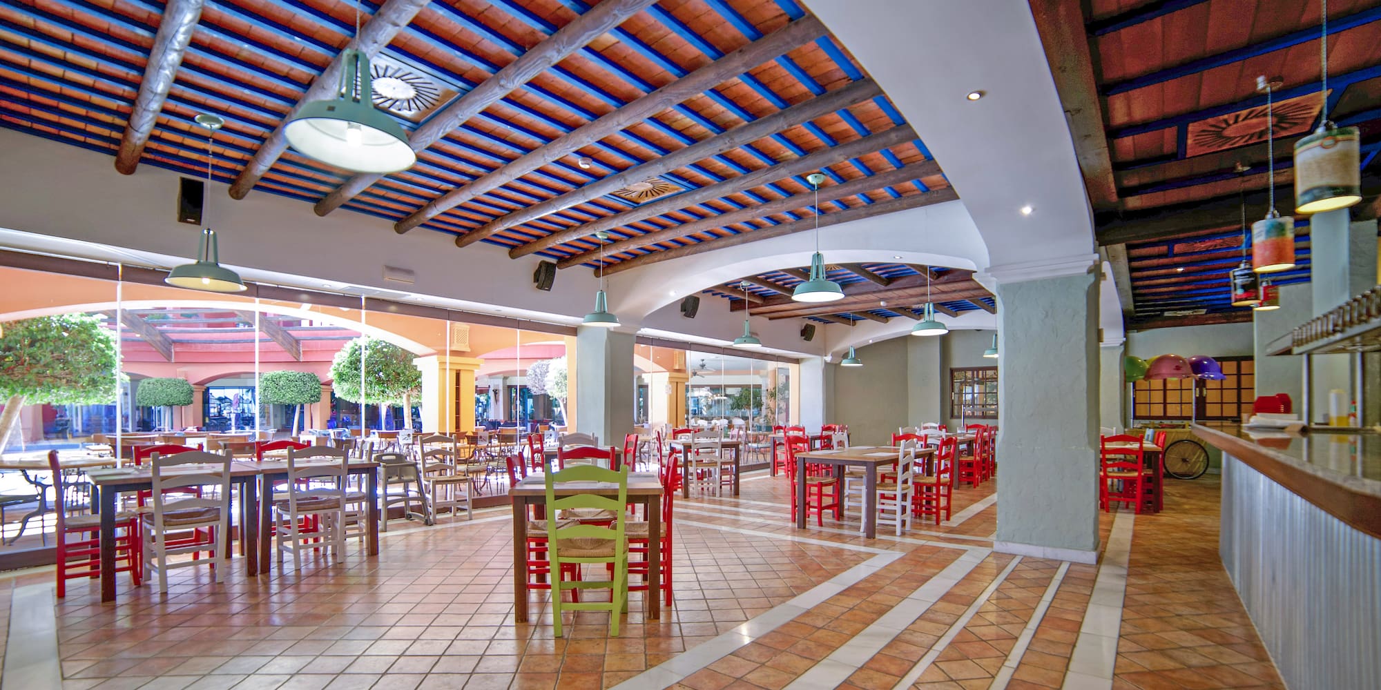 a large room with tables and chairs