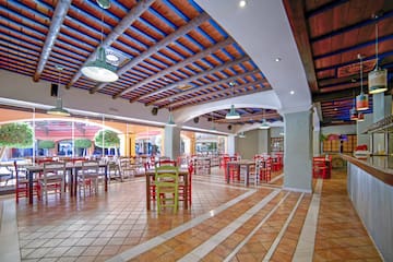 a large room with tables and chairs