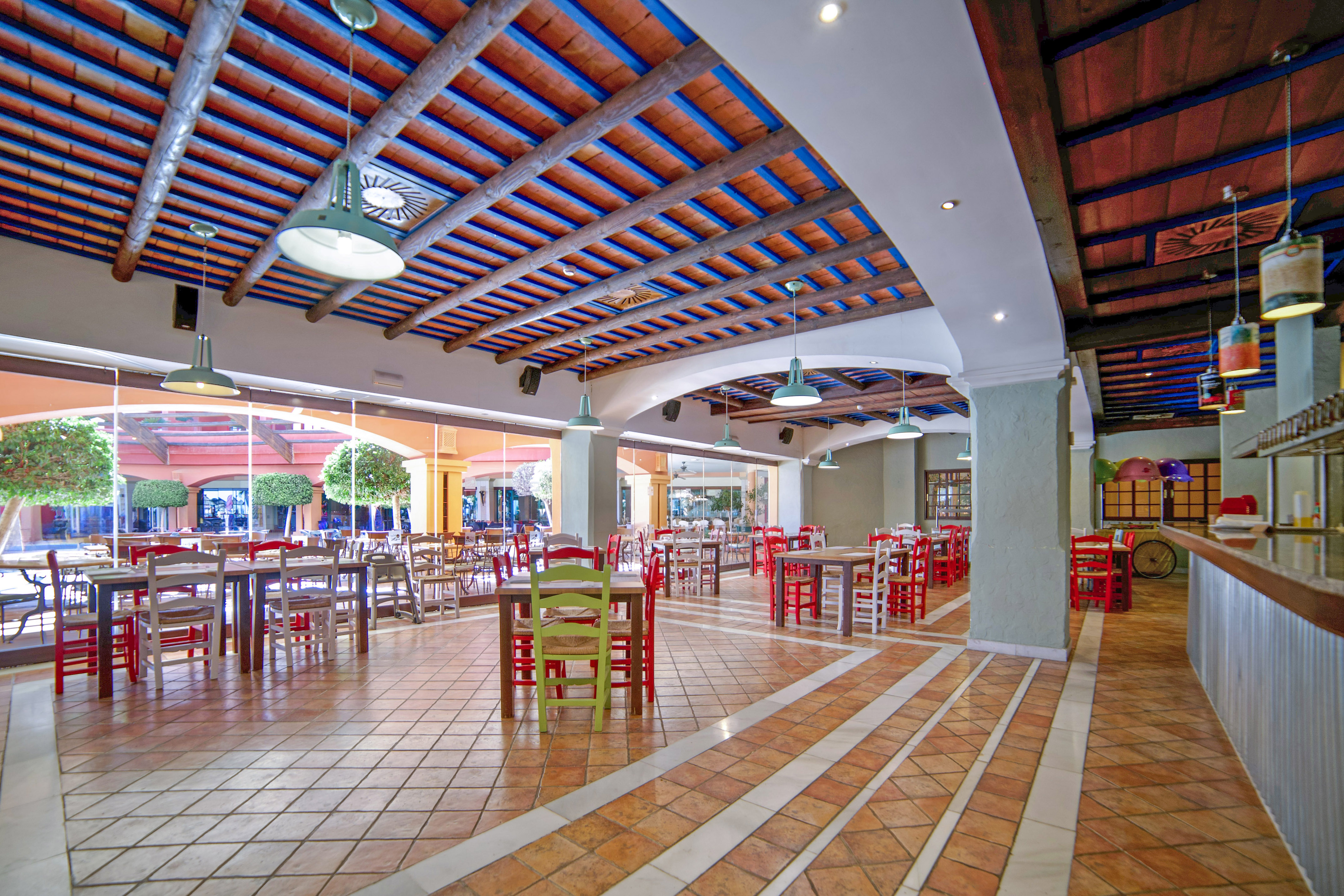 a large room with tables and chairs