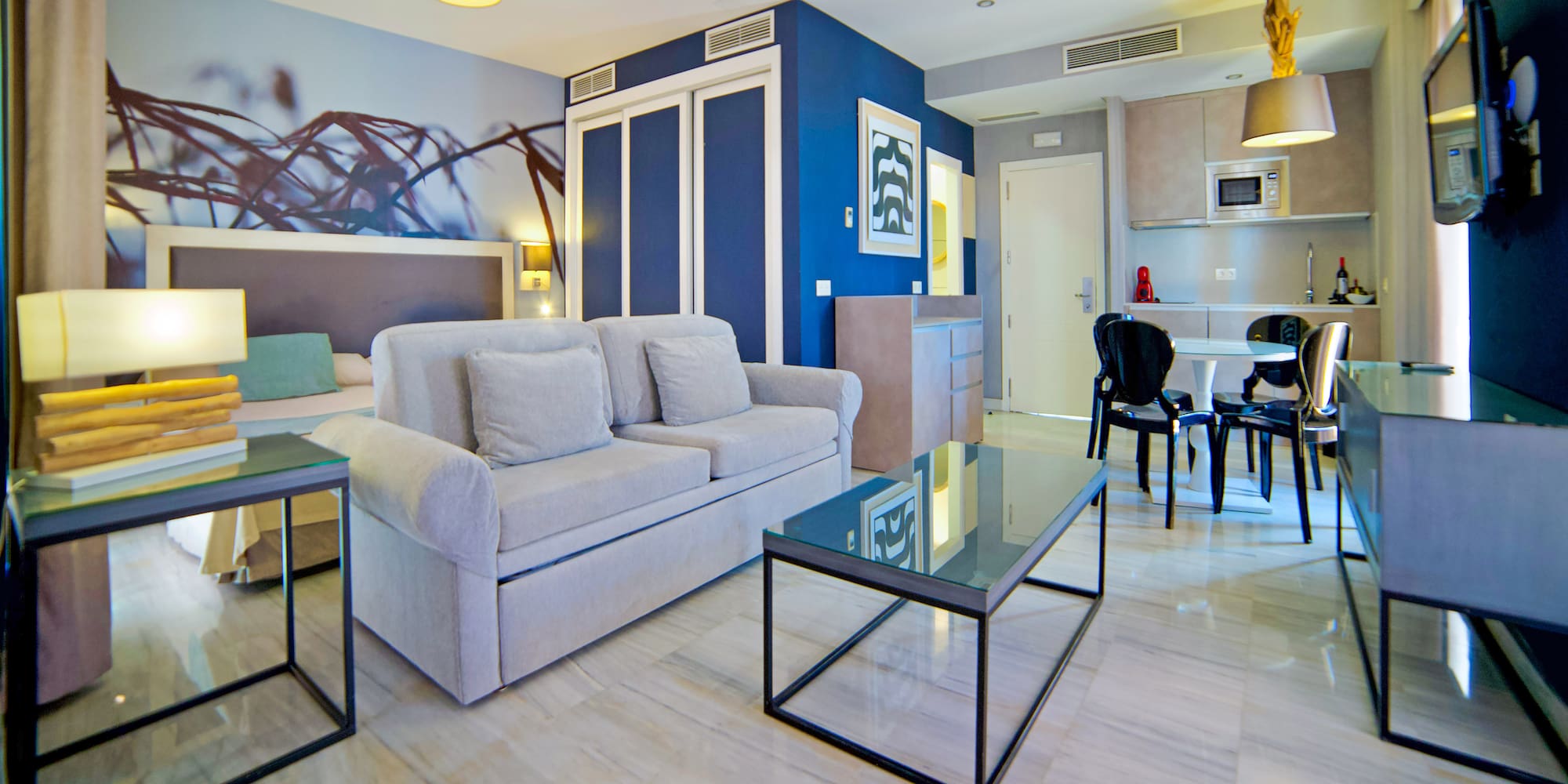 a living room with a couch and a table