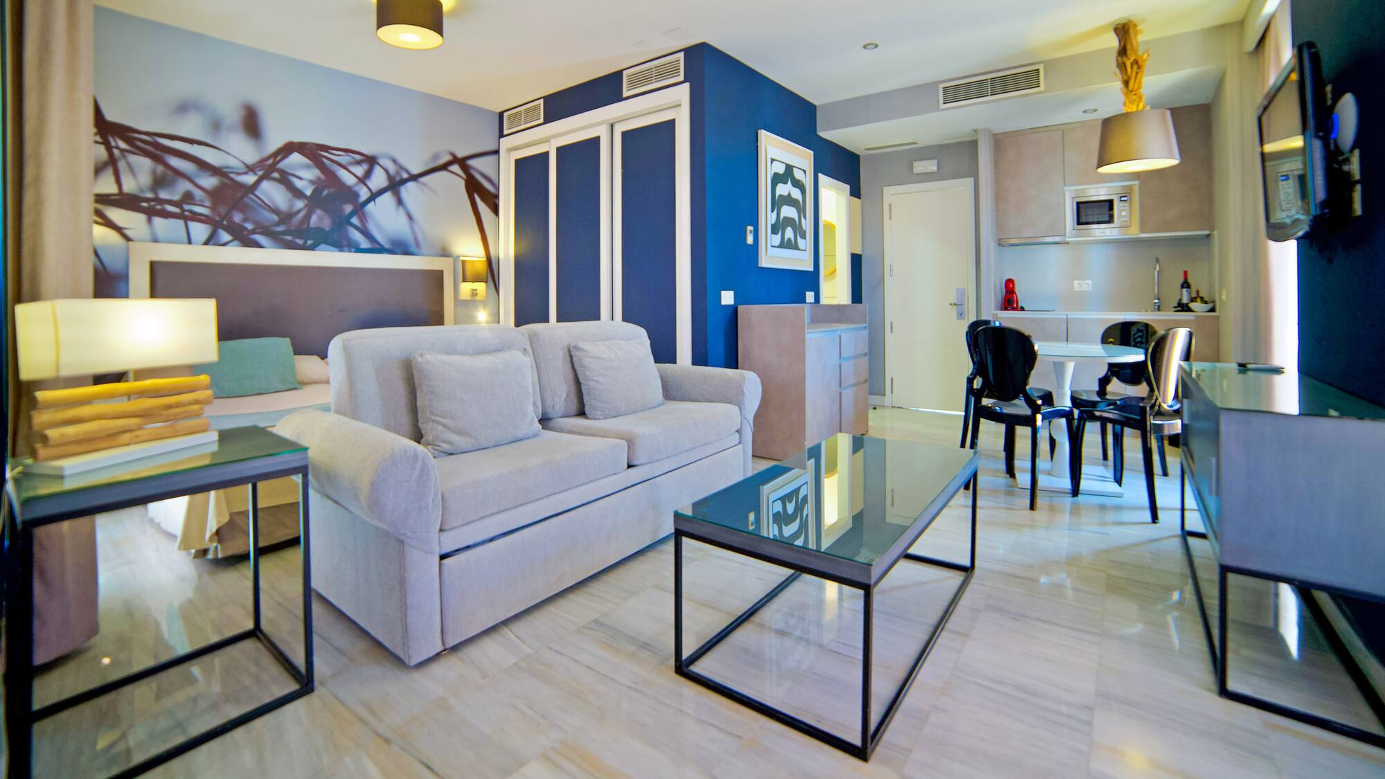 a living room with a couch and a table