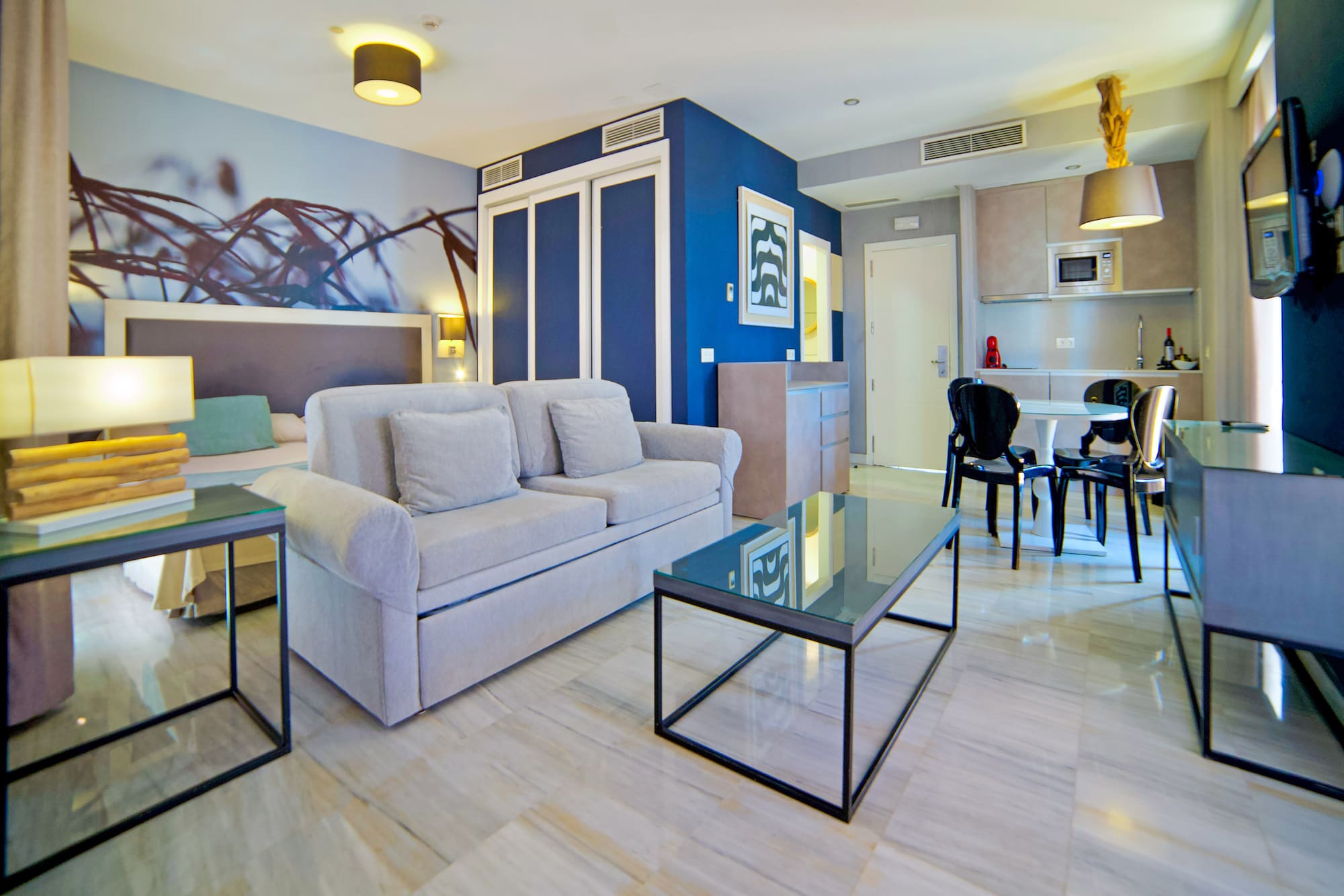 a living room with a couch and a table