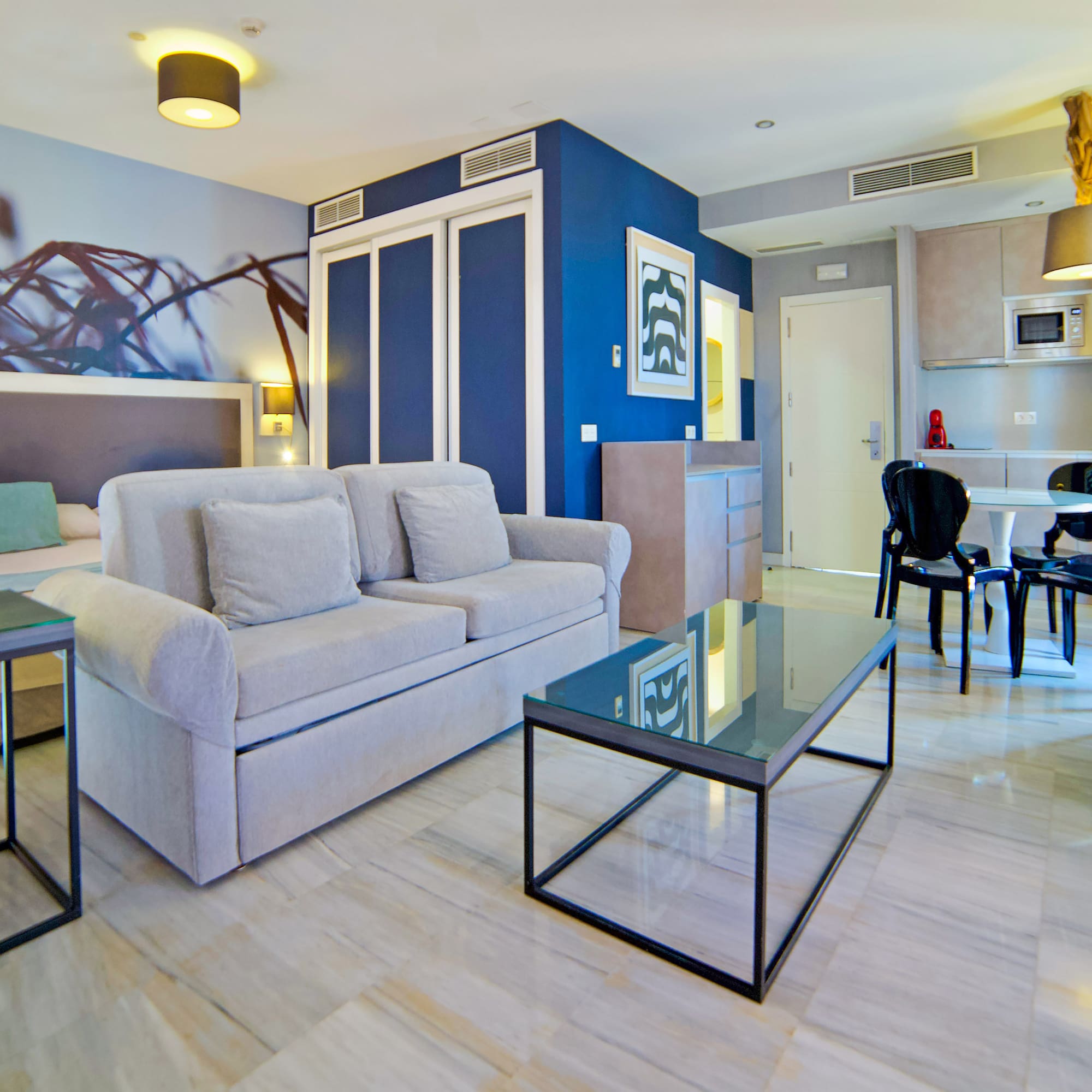 a living room with a couch and a table