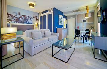 a living room with a couch and a table