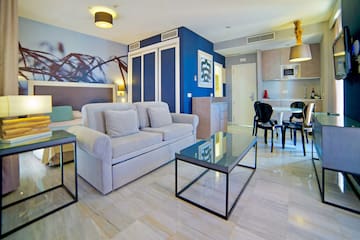 a living room with a couch and a table