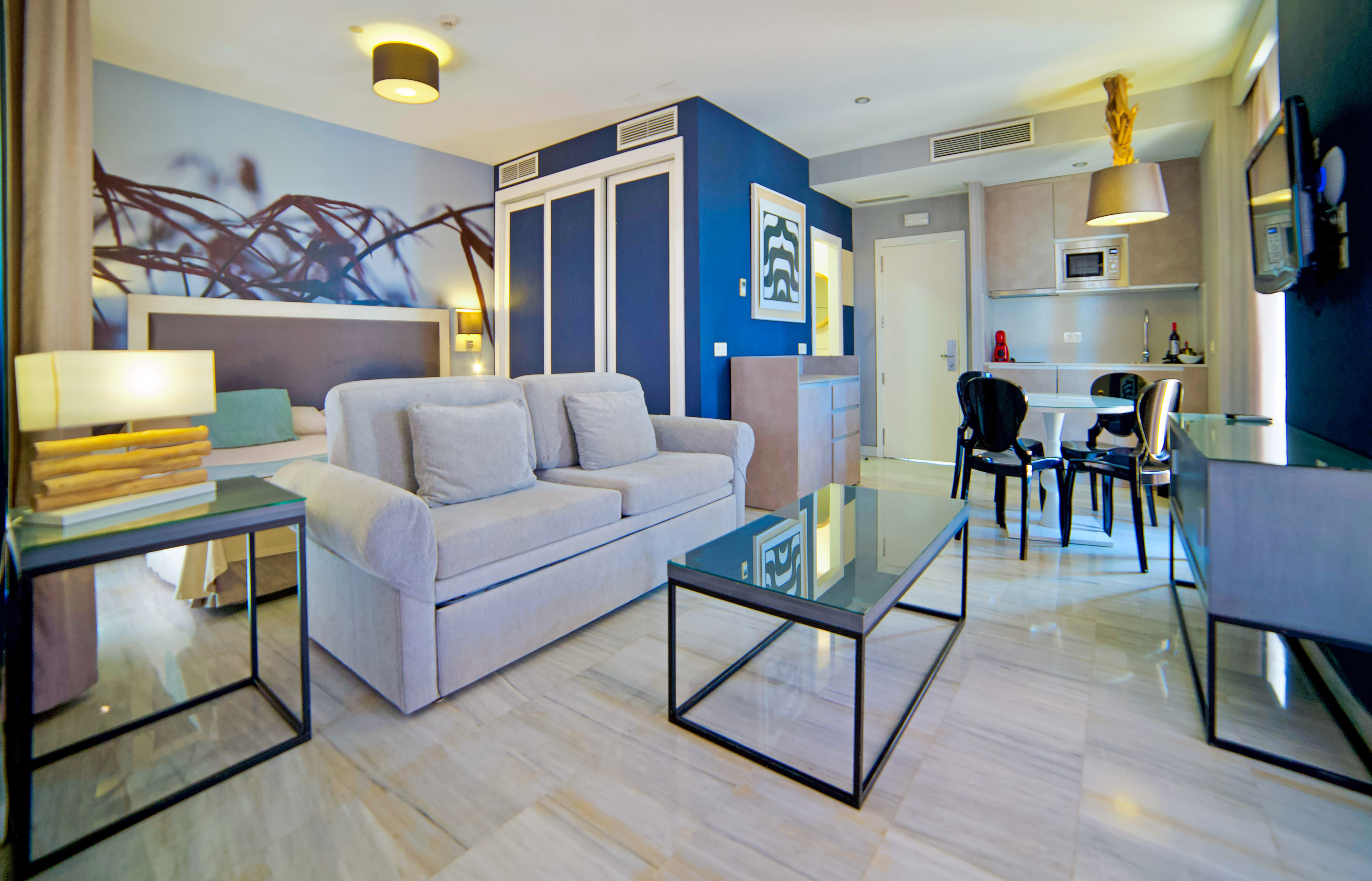 a living room with a couch and a table