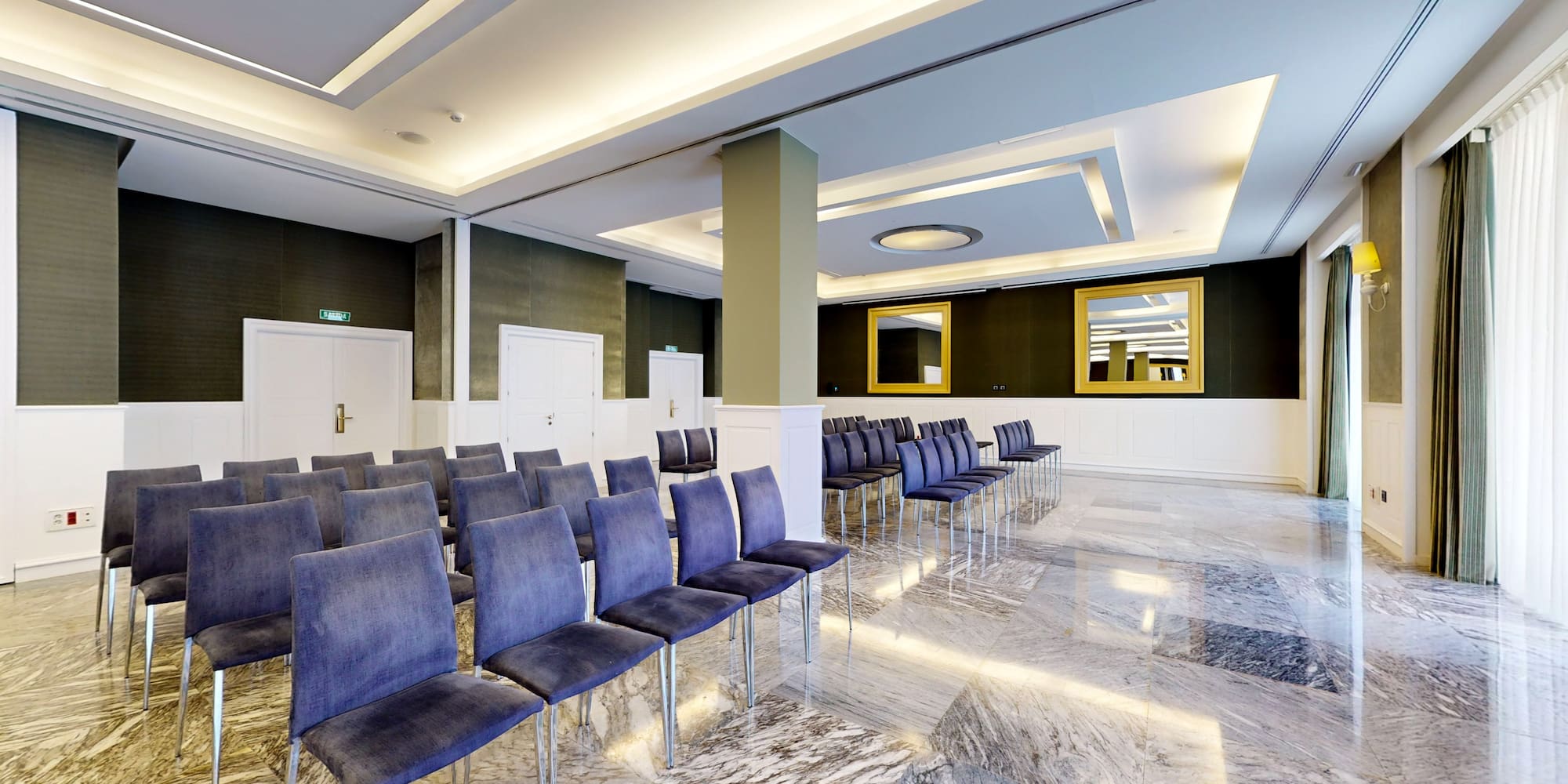 a room with rows of chairs