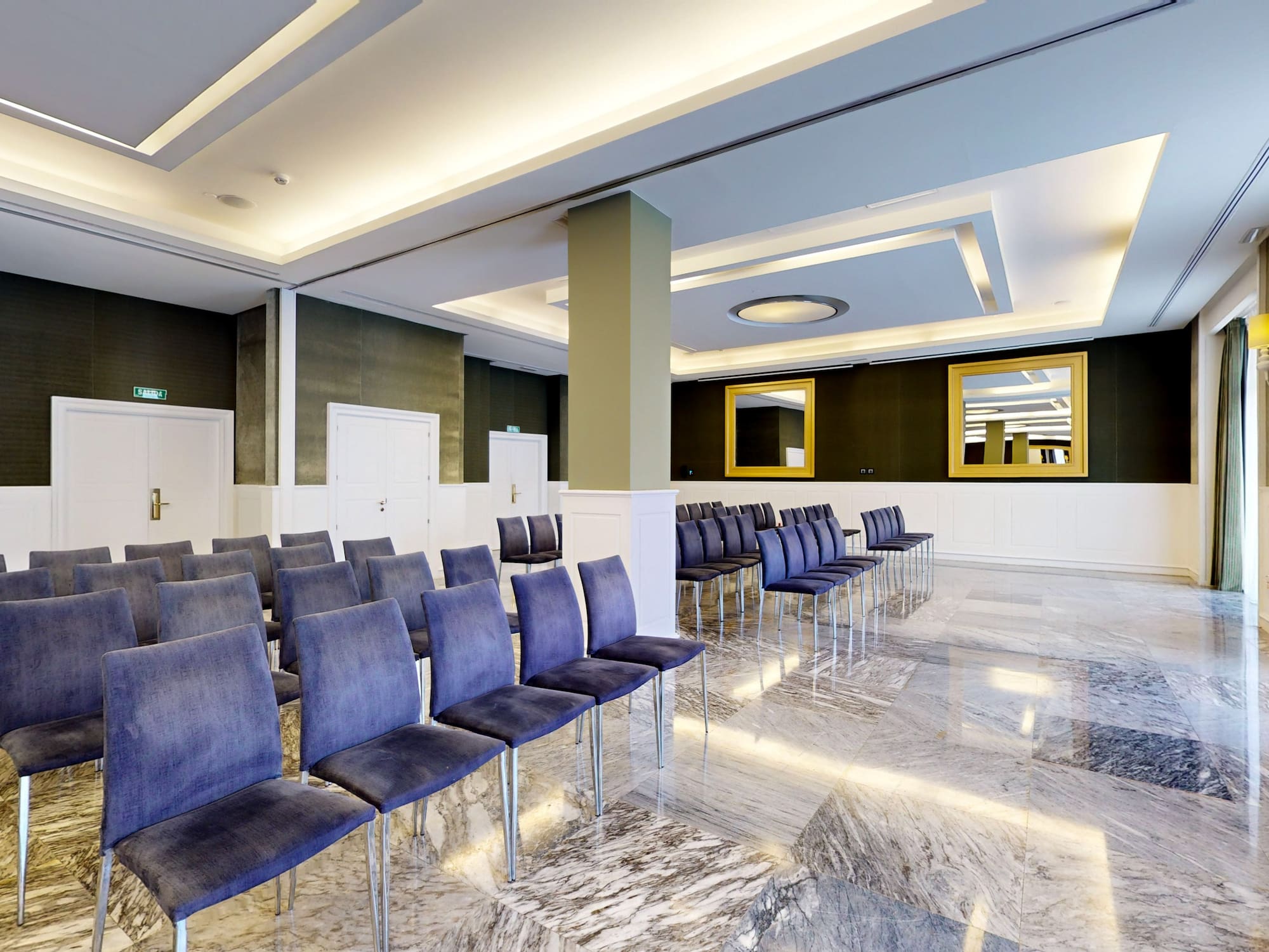 a room with rows of chairs