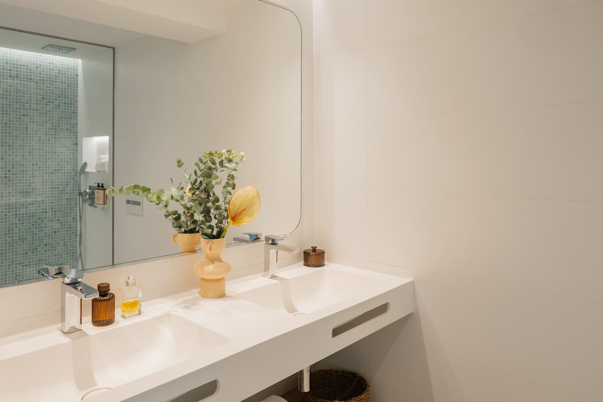 a bathroom with a mirror and sink