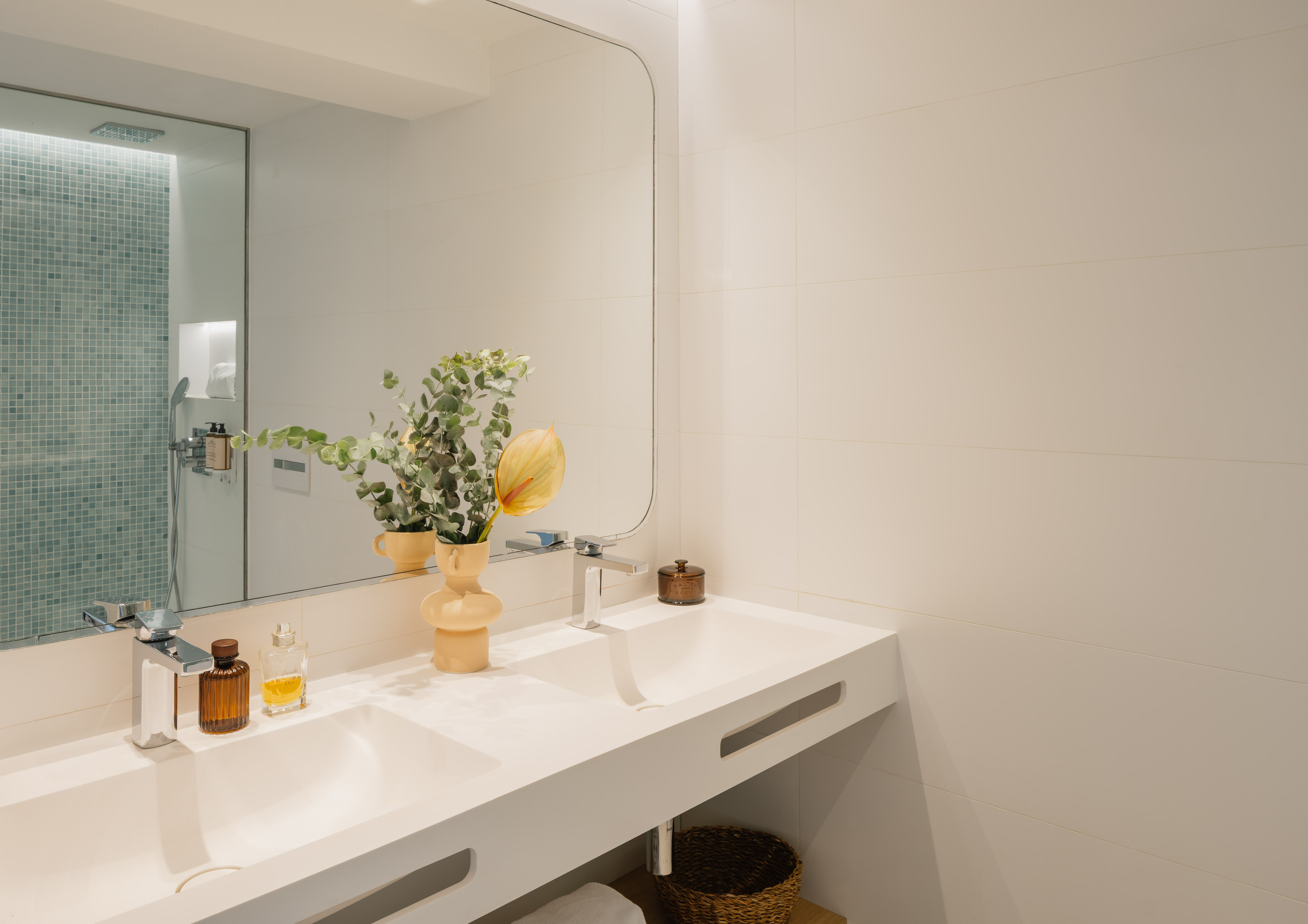 a bathroom with a mirror and sink