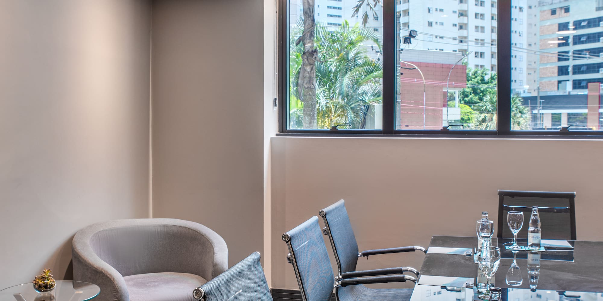 a room with a table and chairs