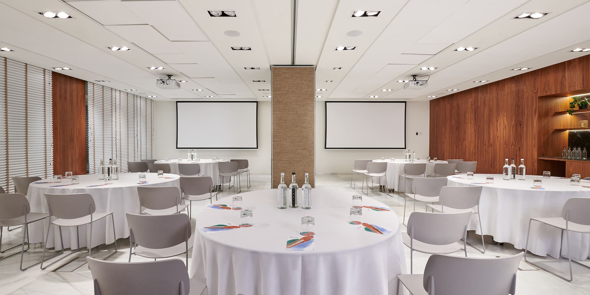 a room with tables and chairs